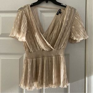 NWT! Express Flutter Sleeve Top with Low Back in Champagne with Gold Polka Dots